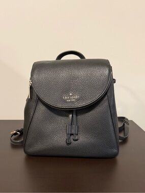 Kate Spade New York Black Pebbled Leather Flap Backpack